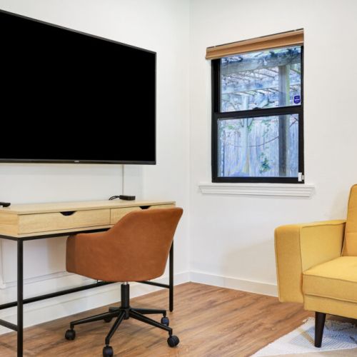 Smart TV with streaming channels! Desk and comfortable chair included.