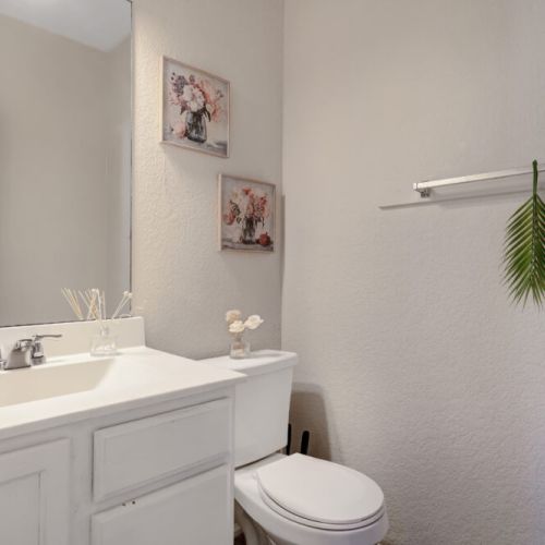 Half bath in the game room for maximum convenience.