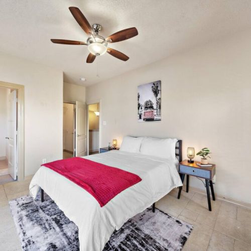 2nd bedroom with queen size bed and another balcony.