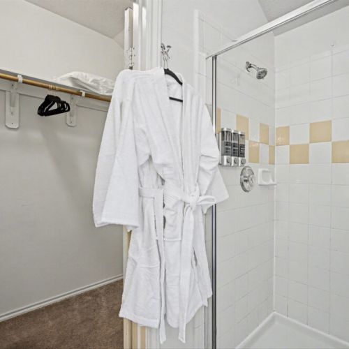 White robes and towels included.  Shampoo, conditioner, body wash, and body soap included for maximum comfort.
