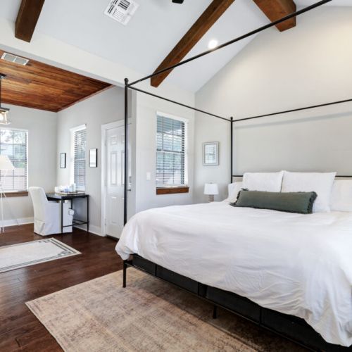 Primary bedroom with king size bed.