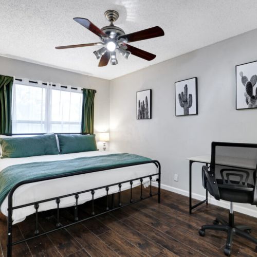 Primary bedroom with king size bed.