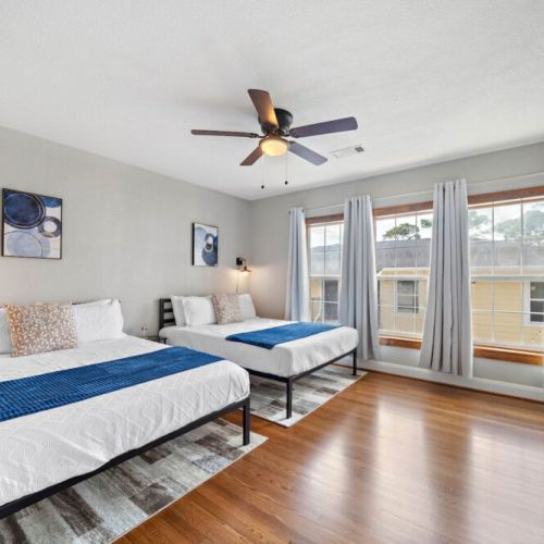 Bedroom with two queen size beds! Super comfortable memory foam mattresses.
