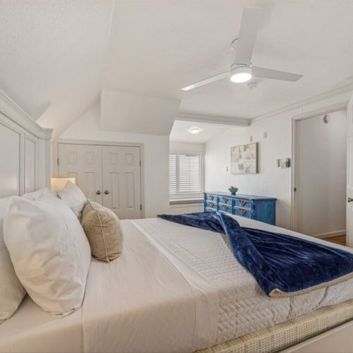 Adorned with high-quality linens. Dresser included.