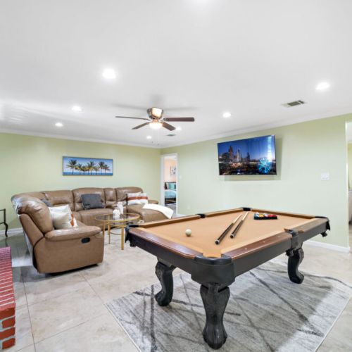 Full-size pool table included.