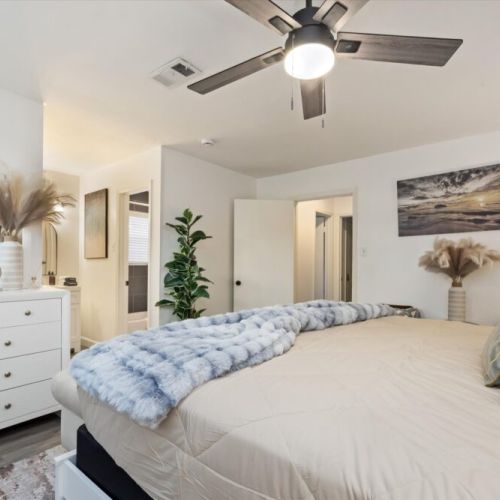 Adorned with high-quality linens. Dresser included.