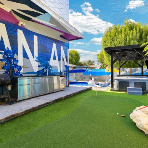 Convenient outdoor kitchen with a peaceful view.