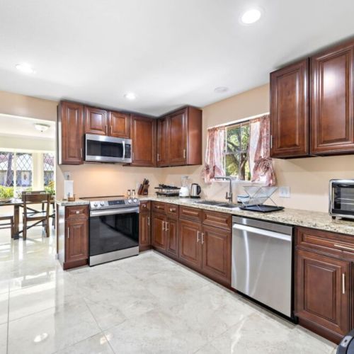 Fridge dispenses water and ice! Stainless steel appliances.