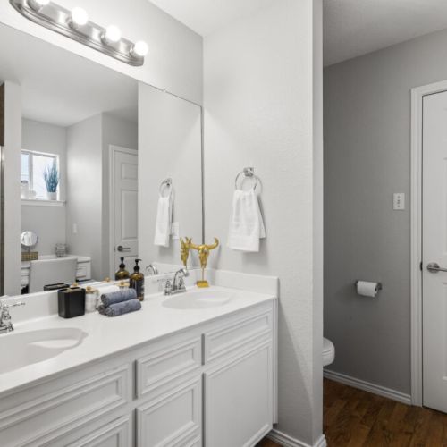 Primary bathroom is fully stocked with all you need. Makeup pads and q-tips included.