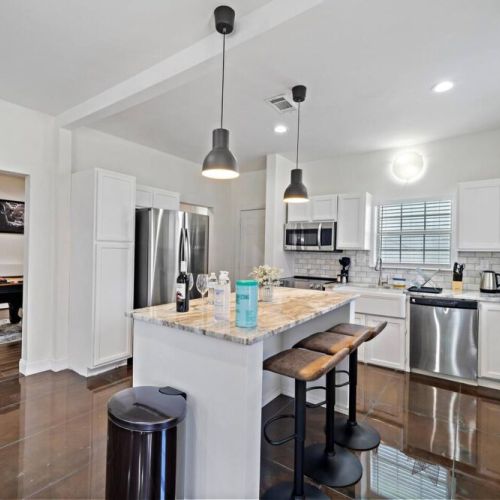 Fridge dispenses water and ice! Stainless steel appliances.