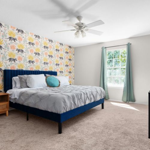 Primary bedroom with king size bed.