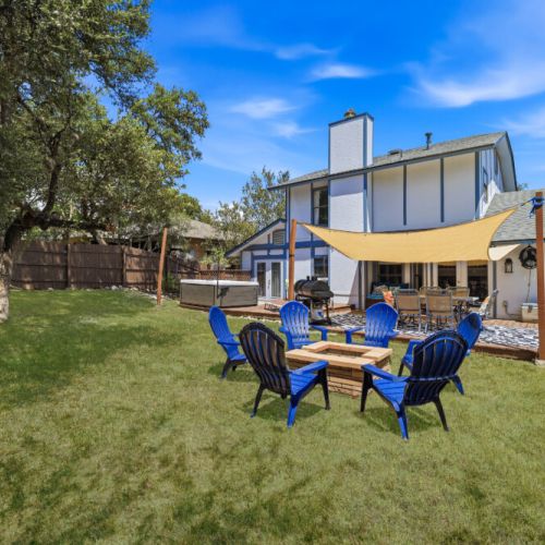 Enjoy laid-back evenings by the fire pit with comfy patio seating and warm, glowing flames that make every night unforgettable.
