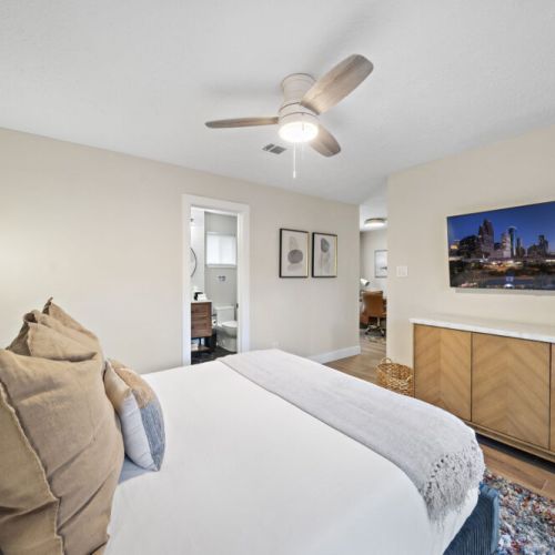 Smart TV and full-length mirror included.