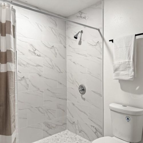 With walk-in shower.