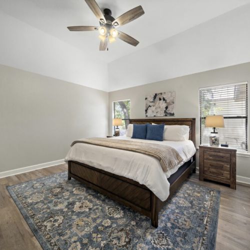 Primary bedroom with king size bed.