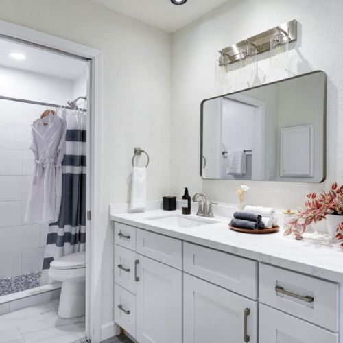 Primary bathroom is fully stocked with all you need.