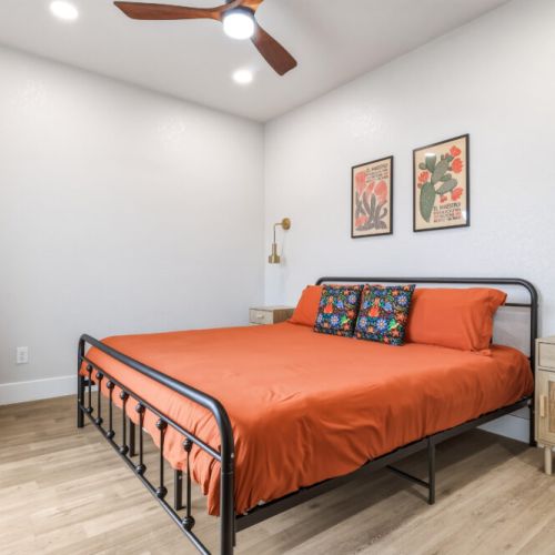 Primary bedroom with a king size bed.