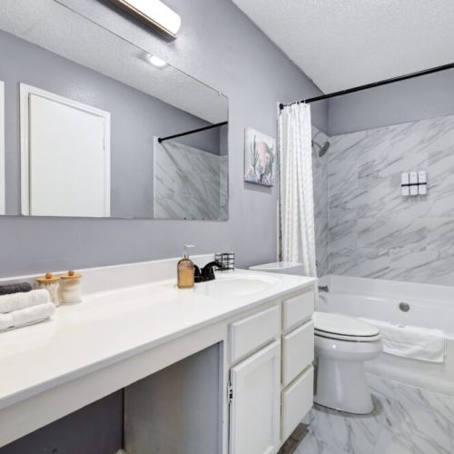 Primary bathroom is fully stocked with all you need. Makeup pads and q-tips included.