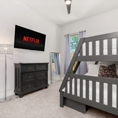 2nd bedroom with queen size bed and twin size bed (bunk bed). Smart TV included.