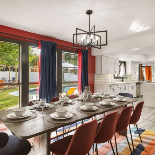 Spacious main  dining table that sits 10 with full tableware and silverware included.