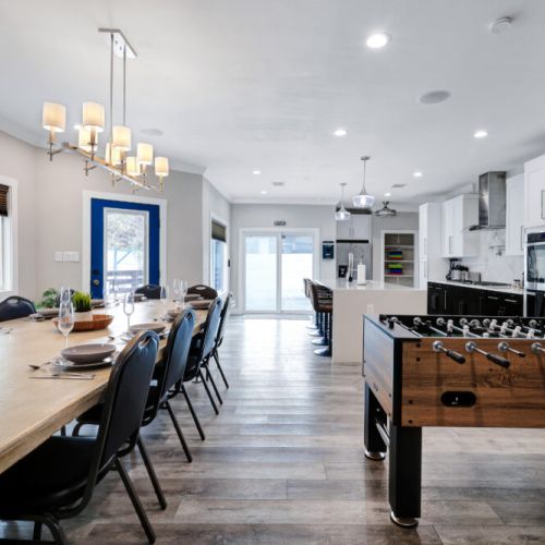 Spacious dining table that sits 12 with full tableware and silverware included.