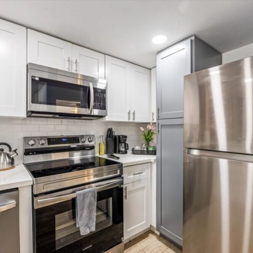 Stainless steel appliances. Coffee bar with drip coffee machine and complimentary coffee, tea, sugar and cream included!