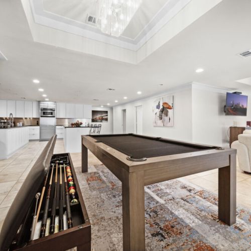 Pool table included underneath the dining table. Are you ready to have some fun?