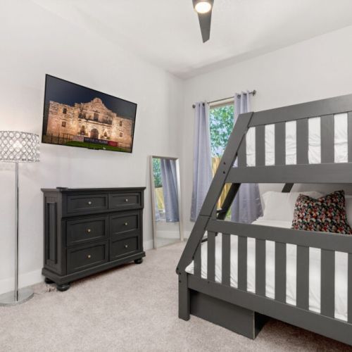 2nd bedroom with queen size bed and twin size bed (bunk bed). Smart TV included.