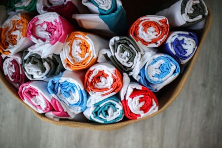 Fresh, colorful towels are provided for a comfortable and convenient stay.