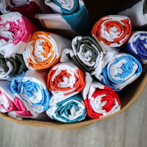 Fresh, colorful towels are provided for a comfortable and convenient stay.