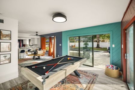 Challenge your group to a game of pool while enjoying beautiful views of the backyard.