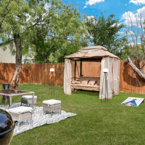 Savor the joy of cooking alfresco with our charcoal grill, creating delicious meals while enjoying quality moments with your family and friends. Plus, we include a corhole set!