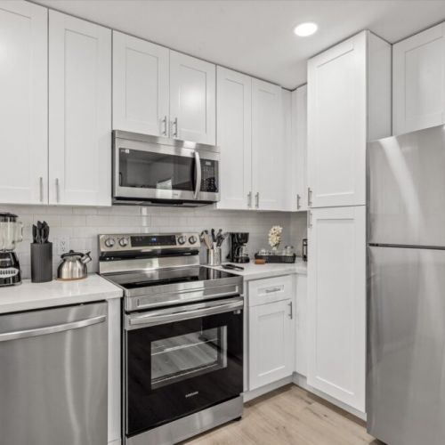 Stainless steel appliances. Coffee bar with drip coffee machine and complimentary coffee, tea, sugar and cream included!