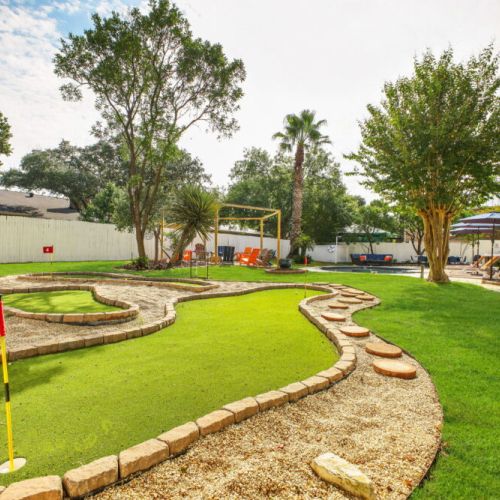 Unique mini-golf in backyard for ultimate level of entertainment.