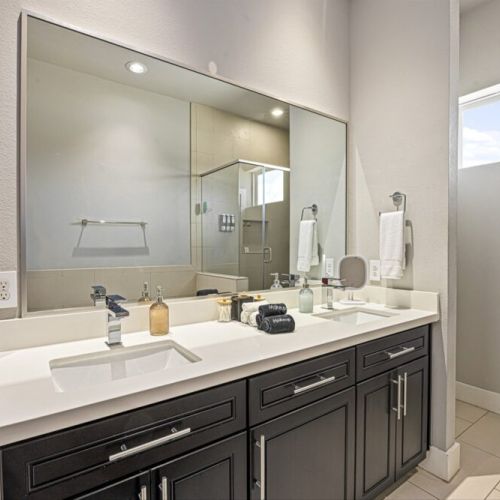 Primary bathroom is fully stocked with all you need. Makeup pads and q-tips included.