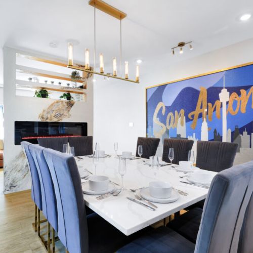 Spacious dining table that sits 10 with full tableware and silverware included.