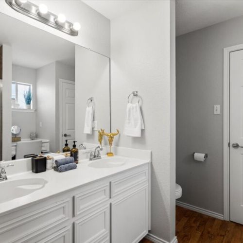 Primary bathroom is fully stocked with all you need. Makeup pads and q-tips included.
