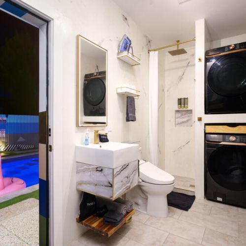 6th full bathroom is fully stocked with all you need. Additional washer/dryer