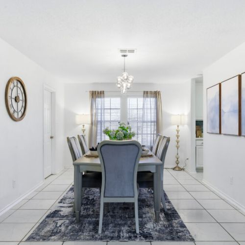 Spacious 1st dining table that sits 6, with full tableware and silverware included.