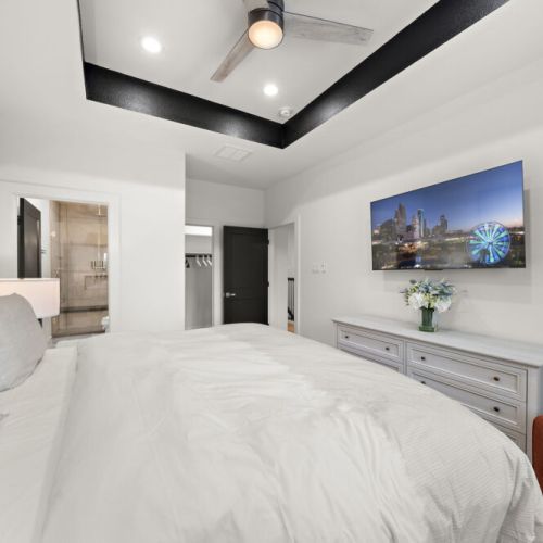 TV and full-length mirror included.