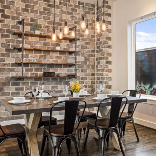 Spacious dining table that sits 6 with full tableware and silverware included.