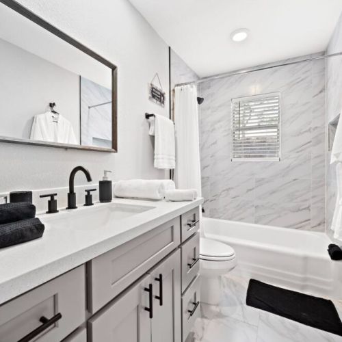 2nd full bathroom is fully stocked with all you need. White robes included.