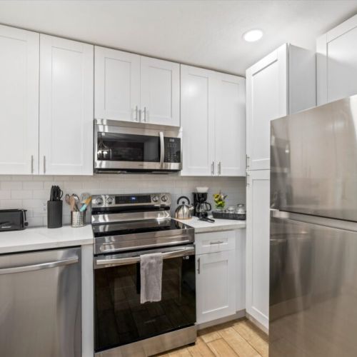 Stainless steel appliances. Coffee bar with drip coffee machine and complimentary coffee, tea, sugar and cream included!