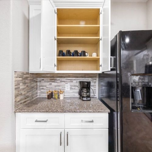 Coffee bar includes a Drip coffee machine with complimentary coffee, decaf, tea, sugar, cream, and sweetener.