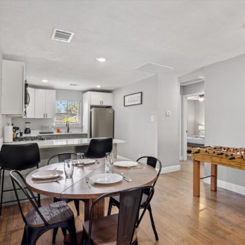 Charming dining table full of tableware and silverware included.