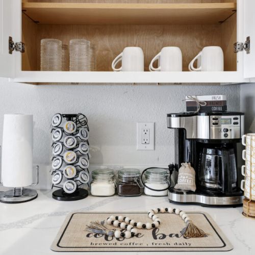 2-Way drip coffee machine with complimentary coffee, tea, sugar, and cream