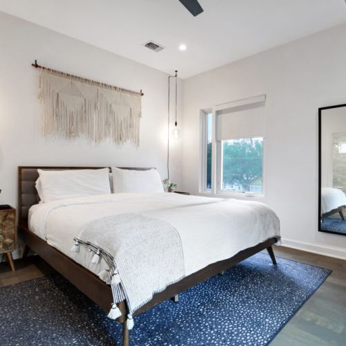 Primary bedroom with king size bed.
