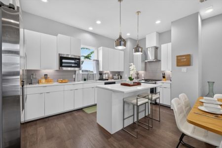 Our beautiful kitchen to whip up amazing meals for the whole group. Also, two bar stools for your convenience!