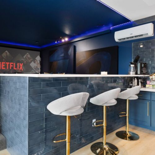 Pour a glass of coffee and catch your morning cartoons on the big screen