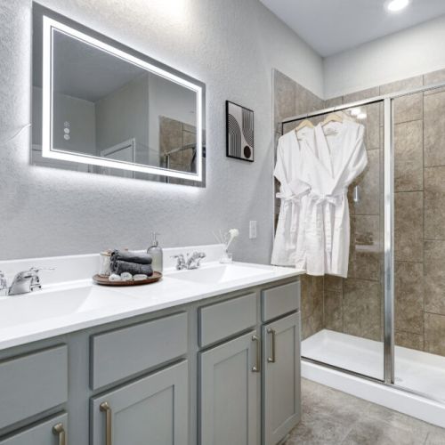 Primary bathroom is fully stocked with all you need. Makeup pads and q-tips included.